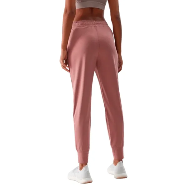 Pantaloni sportivi pentru femei 4F F454 L/ Pink photo 2