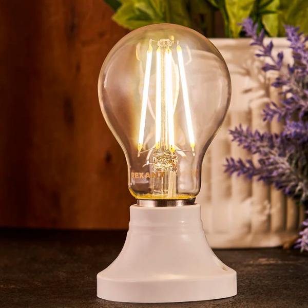 Bec LED cu filament Rexant A60 604-077 E27 / 11.5 W / 4000 K / 1380lm / White photo 4 Bec LED cu filament Rexant A60 604-077 E27 / 11.5 W / 4000 K / 1380lm / White photo 4