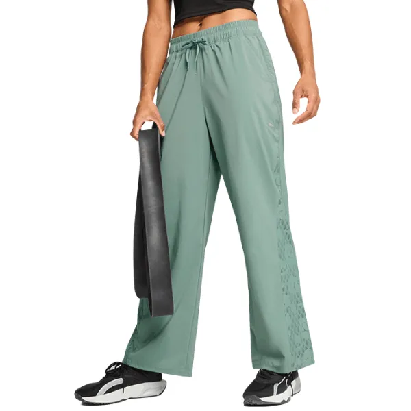 Pantaloni sportivi pentru femei Puma Lace Woven XS / Green photo 4