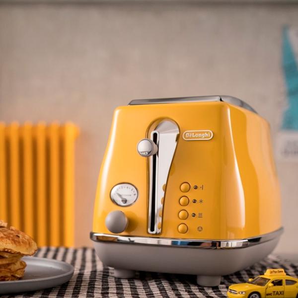 Тостер DeLonghi CTOC 2103 Y Механико-электронный / 900 Вт / Желтый photo 5