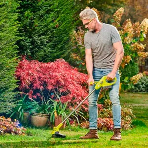 Триммер для травы Ryobi RY18LT23A-120  / Зеленый photo 5 Триммер для травы Ryobi RY18LT23A-120  / Зеленый photo 5