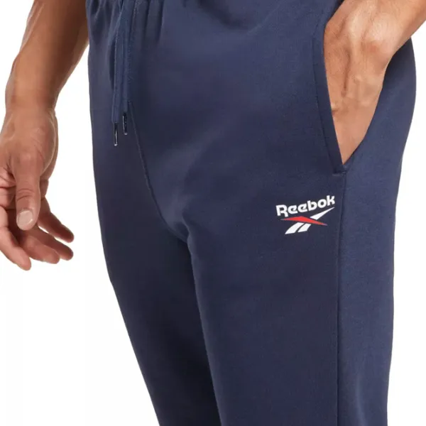 Pantaloni sportivi pentru bărbați Reebok RI Left Leg Jogger M/ Navy photo 5 Pantaloni sportivi pentru bărbați Reebok RI Left Leg Jogger M/ Navy photo 5