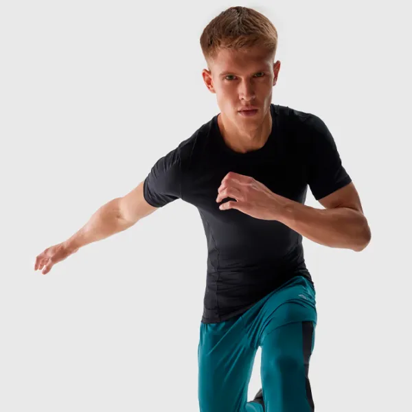 Tricou pentru bărbați 4F 4FWSS24TFTSM600-20S 88% poliester, 12% elastan/ Black photo 4