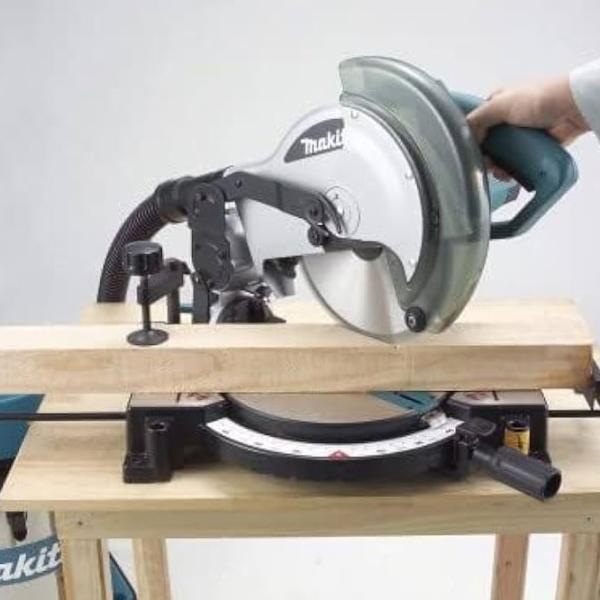 Fierăstrău pentru tăieri înclinate Makita MLS100N 255 mm/ Blue photo 8