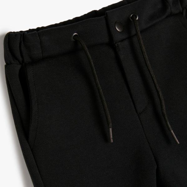 Pantaloni sportivi pentru băieți Koton Basic Sweatpants 5-6/ Black photo 3 Pantaloni sportivi pentru băieți Koton Basic Sweatpants 5-6/ Black photo 3