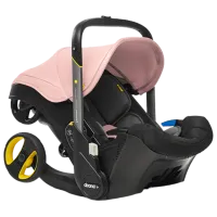 Детское автокресло Doona Infant Car Seat (4755 ) 0 месяцев - 15 месяцев/ 13 кг/ Розовый