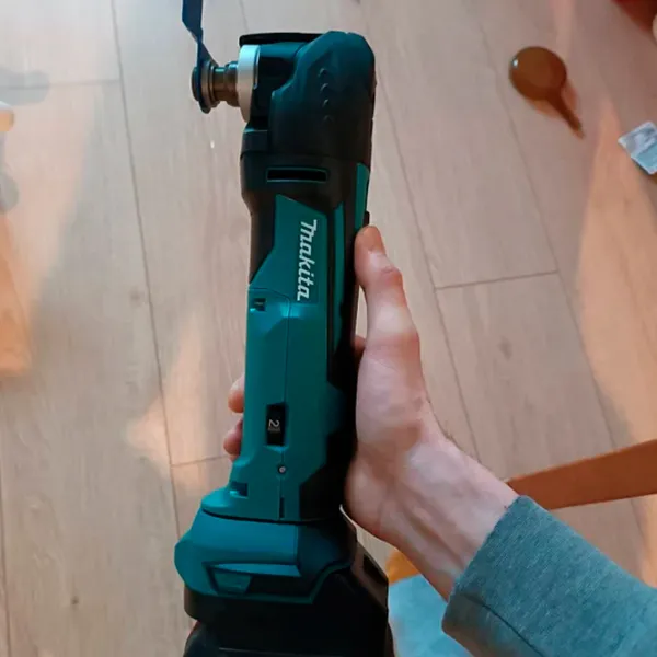 Многофункциональная машина Makita DTM51Z Зеленый / Пластик photo 3 Многофункциональная машина Makita DTM51Z Зеленый / Пластик photo 3