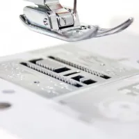 Швейная машина Janome EL-150 Электромеханическая / Белый photo 2